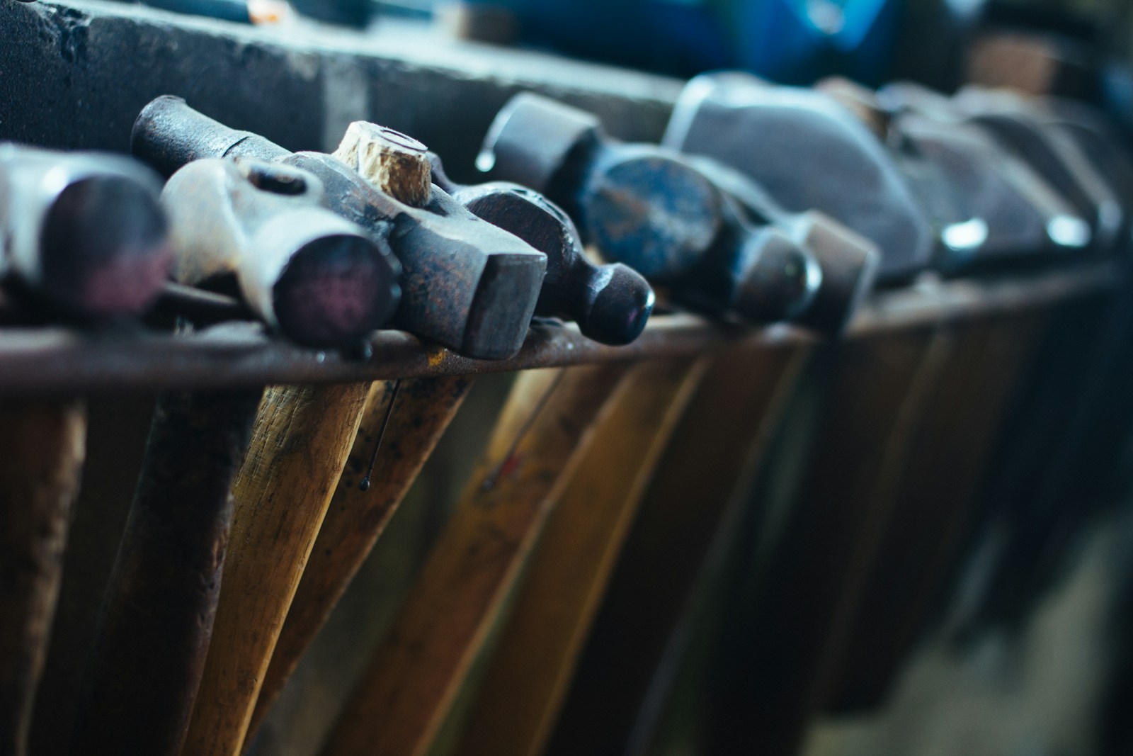 selective focus photo of black-and-brown ball-peen hammers