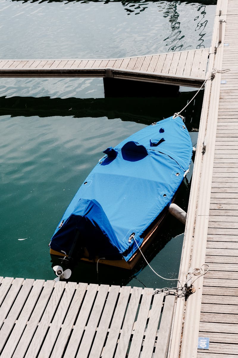 Moored Boat by Pier