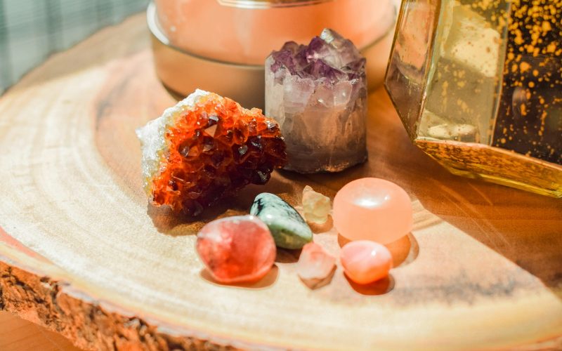 a wooden table topped with different types of rocks