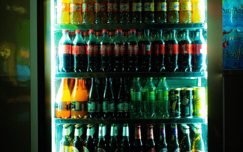 a refrigerator filled with lots of different types of drinks